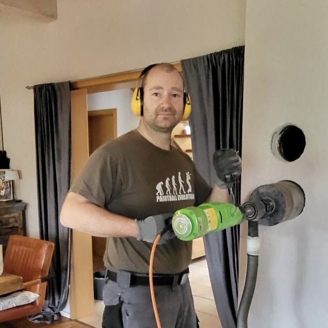 Ofenbaumeister bei der Arbeit